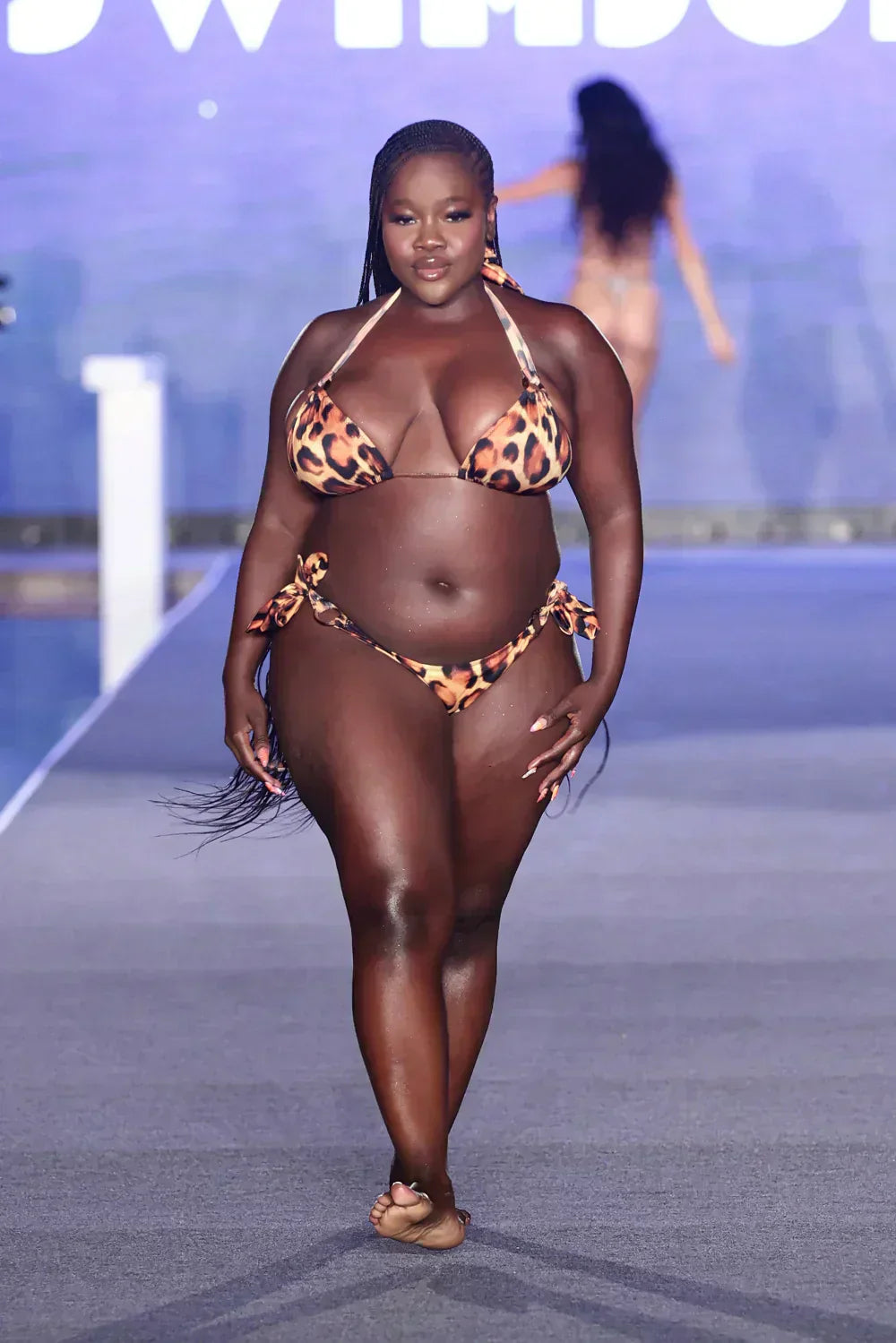 Achieng Agutu walks the runway for the Sports Illustrated Swimsuit Runway Show / John Parra/Getty Images/Sports Illustrated