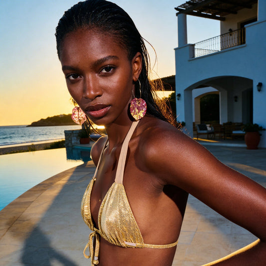 Woman wearing Deessa Ibiza petal earrings